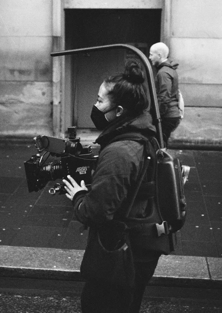Laura Warner operating high end cinema gear on location.