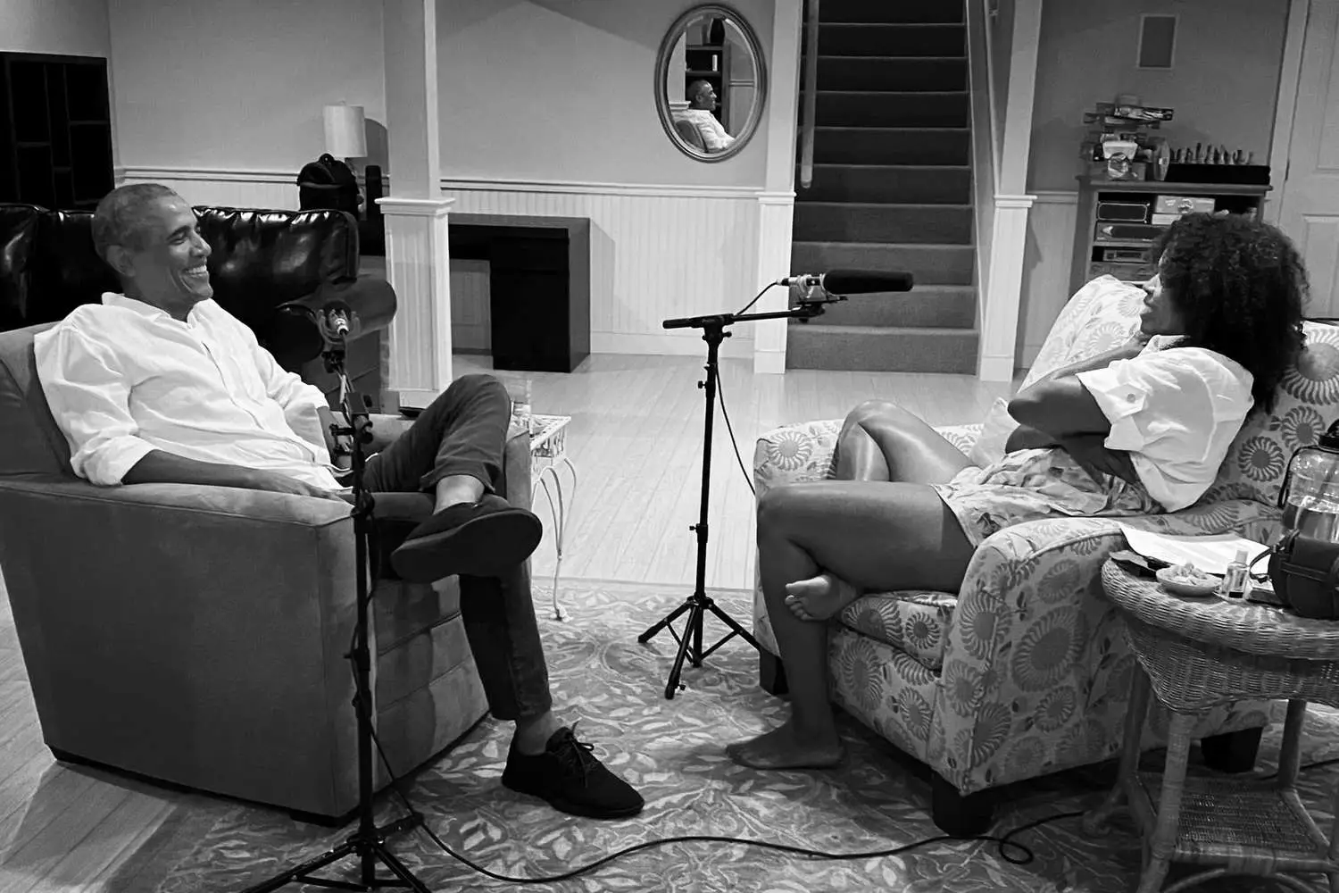 Michelle and Barack talking.