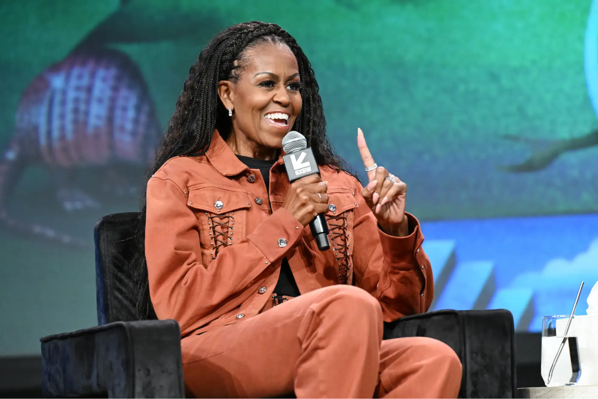 Michelle speaking at Austin.